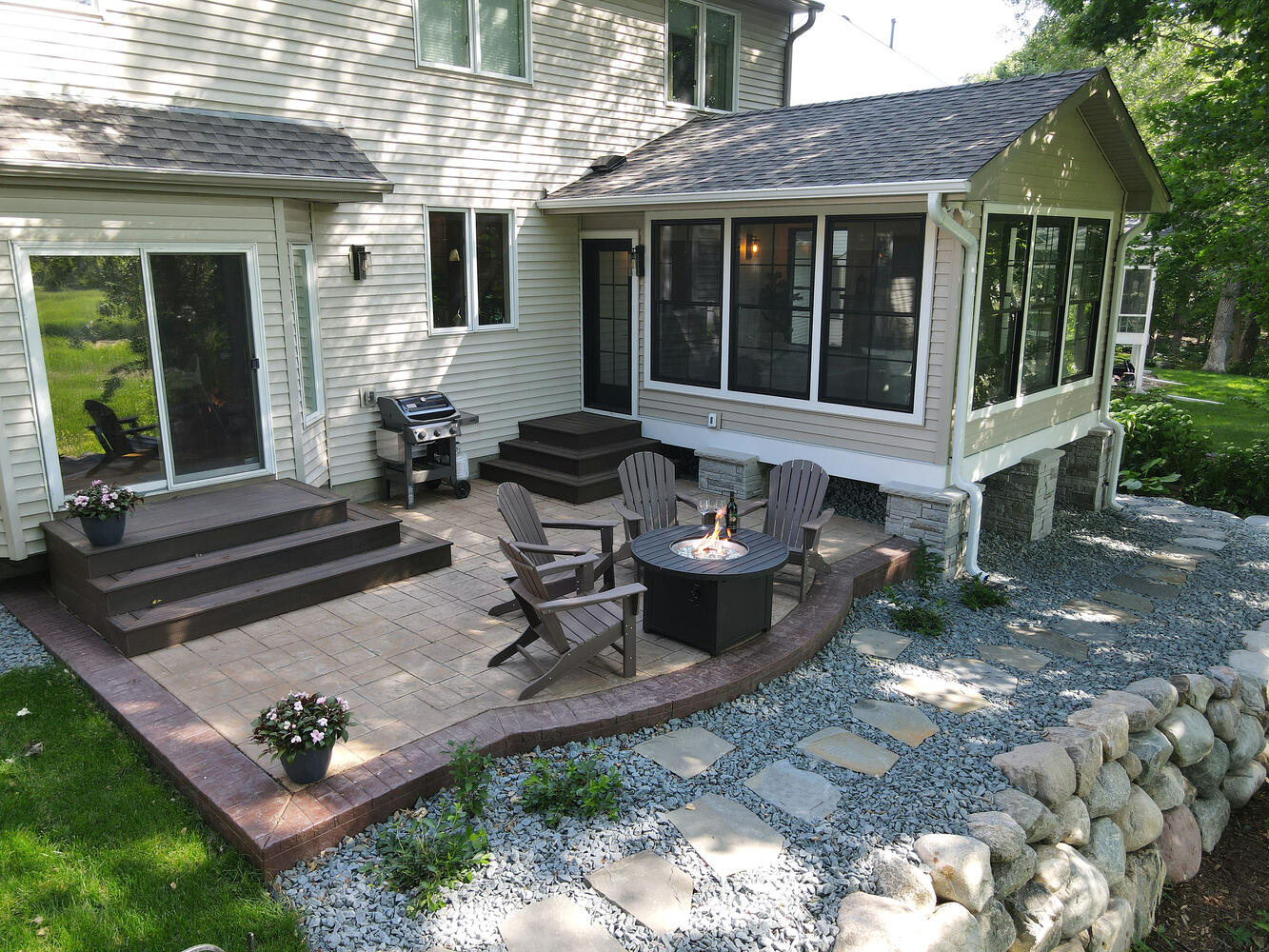 Exterior home remodel with new siding and windows by New Spaces in the Twin Cities